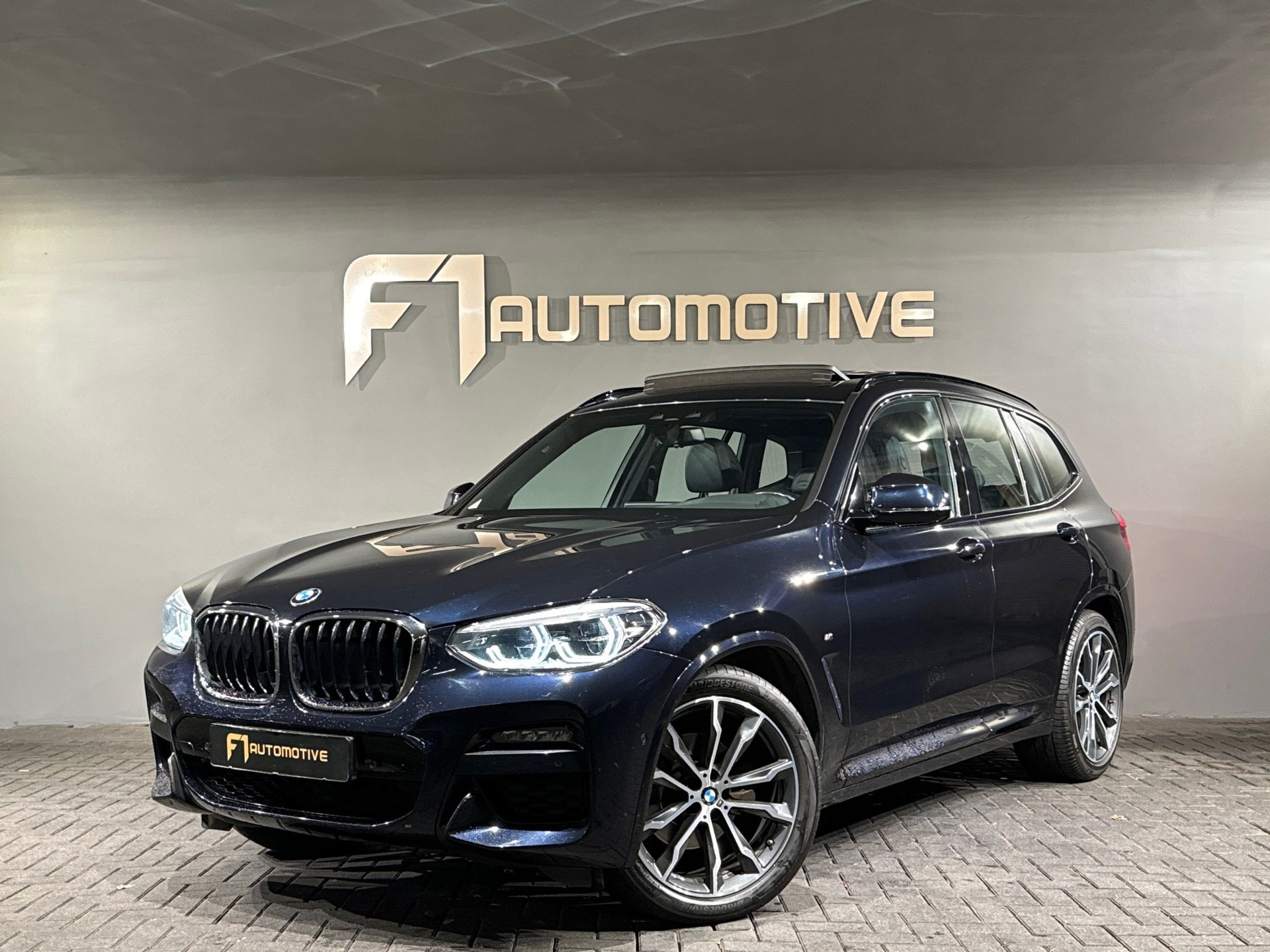 BMW X3 SDrive20i M Sport Pano|Leer|Sfeer|Trekhaak|NL Auto 49854299-0.jpg | F1 Automotive