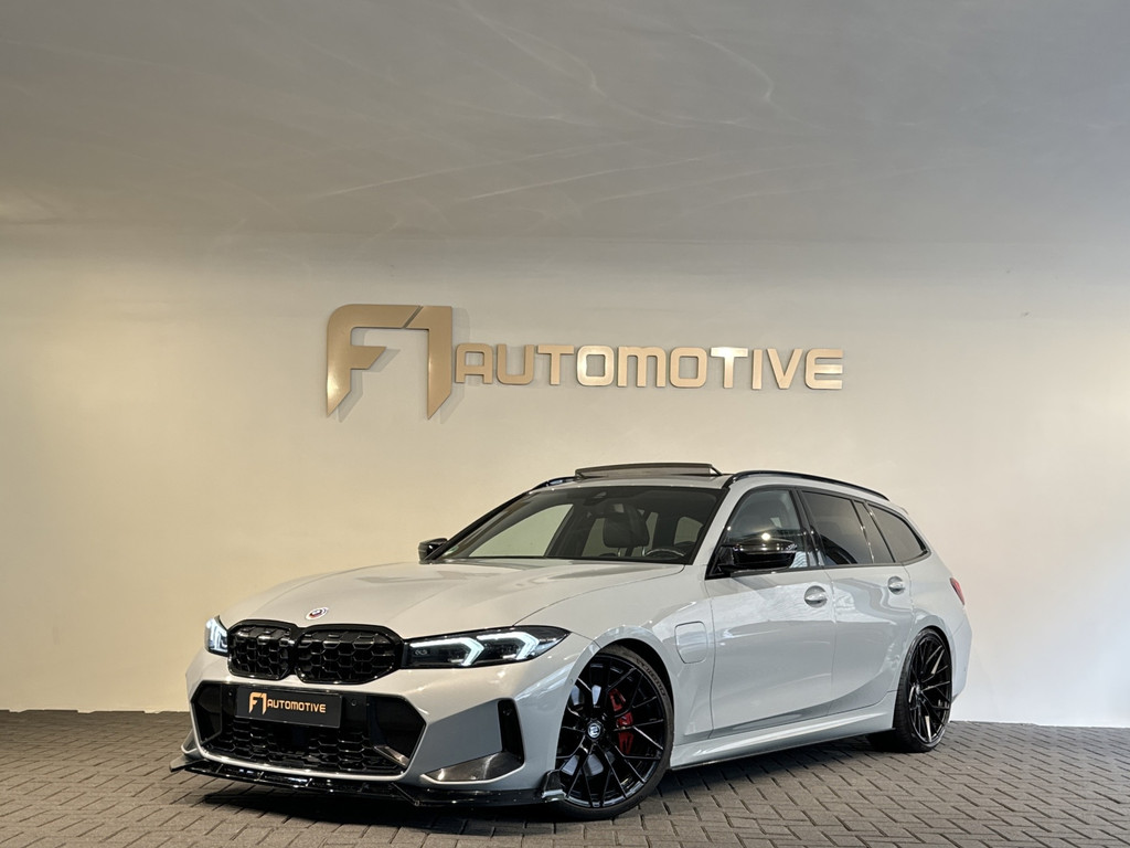 BMW 3 Serie Touring 330e Touring X-Drive Pano|Drive Assist|Blindspot|H/K|Trekhaak 56307696-0.jpg | F1 Automotive