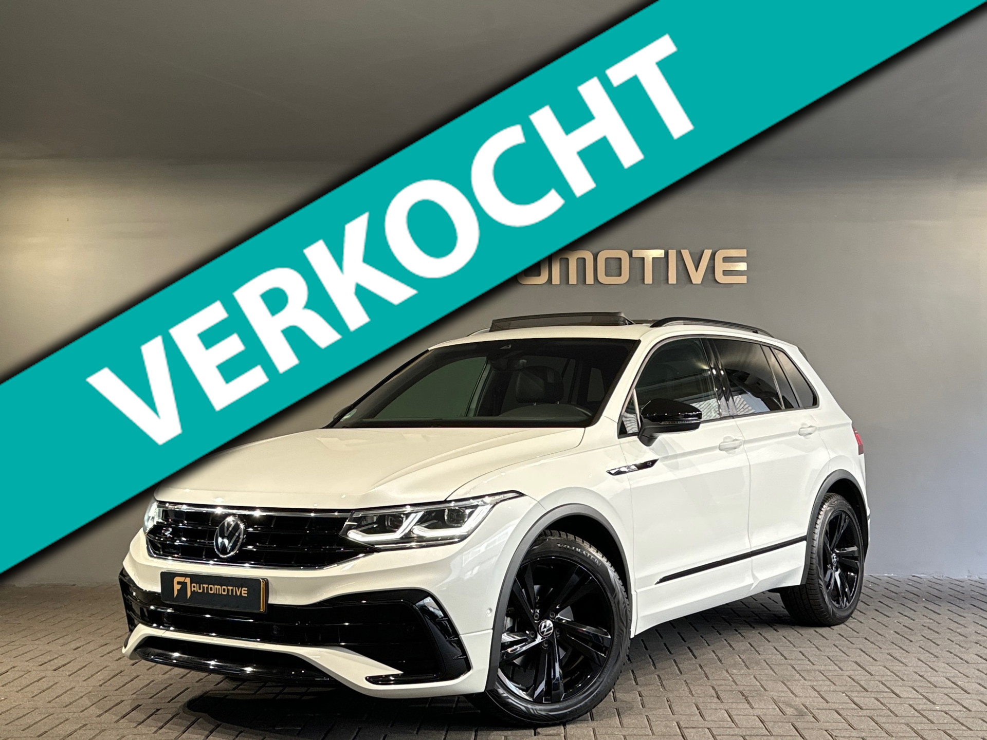 Volkswagen Tiguan 1.5 TSI R-Line Business+ Pano|Leer|Key|H/K 48598256-0.jpg | F1 Automotive